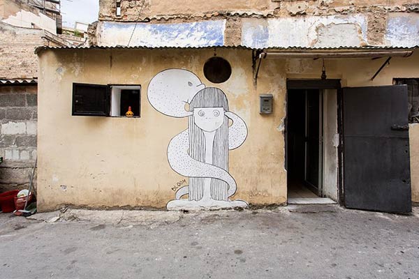 Street art in Palermo, Italy by artist Bloom (Photo by SAPalermo)